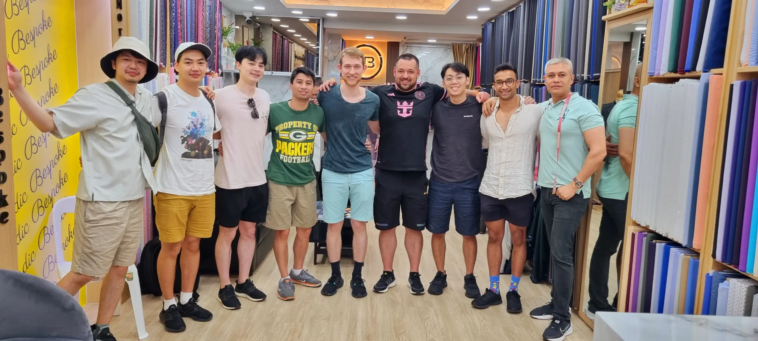 Group of customers posing together in the showroom