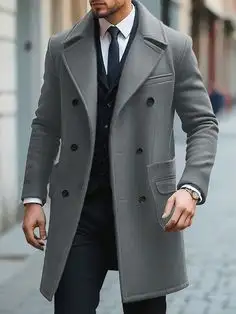 Man wearing a grey double-breasted overcoat over a suit and tie