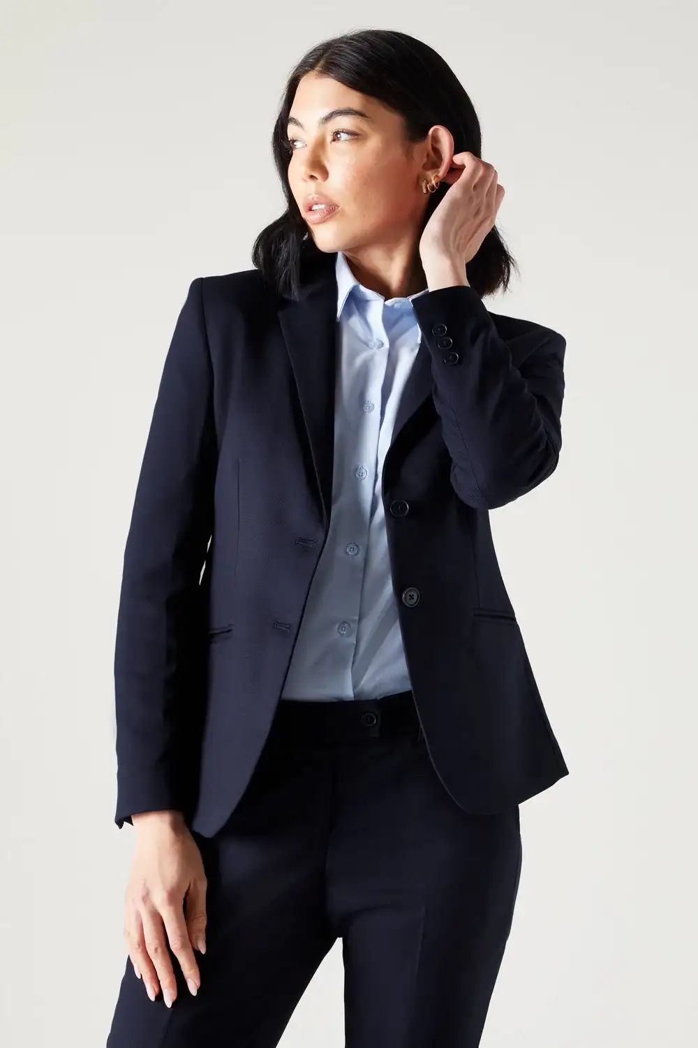 Women’s black tailored blazer styled for professional bespoke fashion