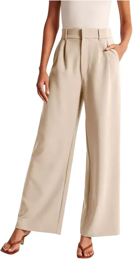 Woman wearing beige wide-leg trousers with a white top
