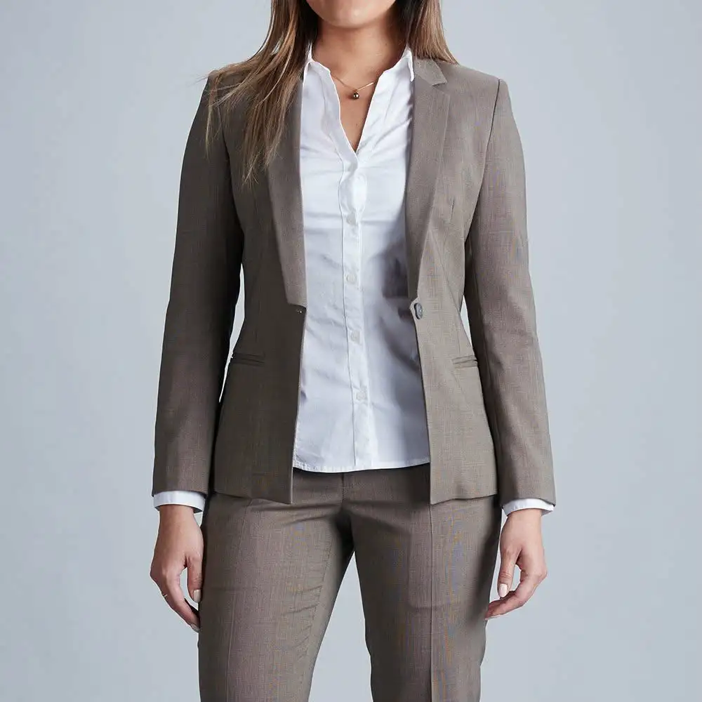Grey trouser suit worn with a white shirt