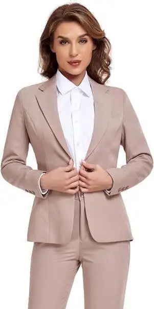 Woman wearing a pink-beige trouser suit with a white shirt